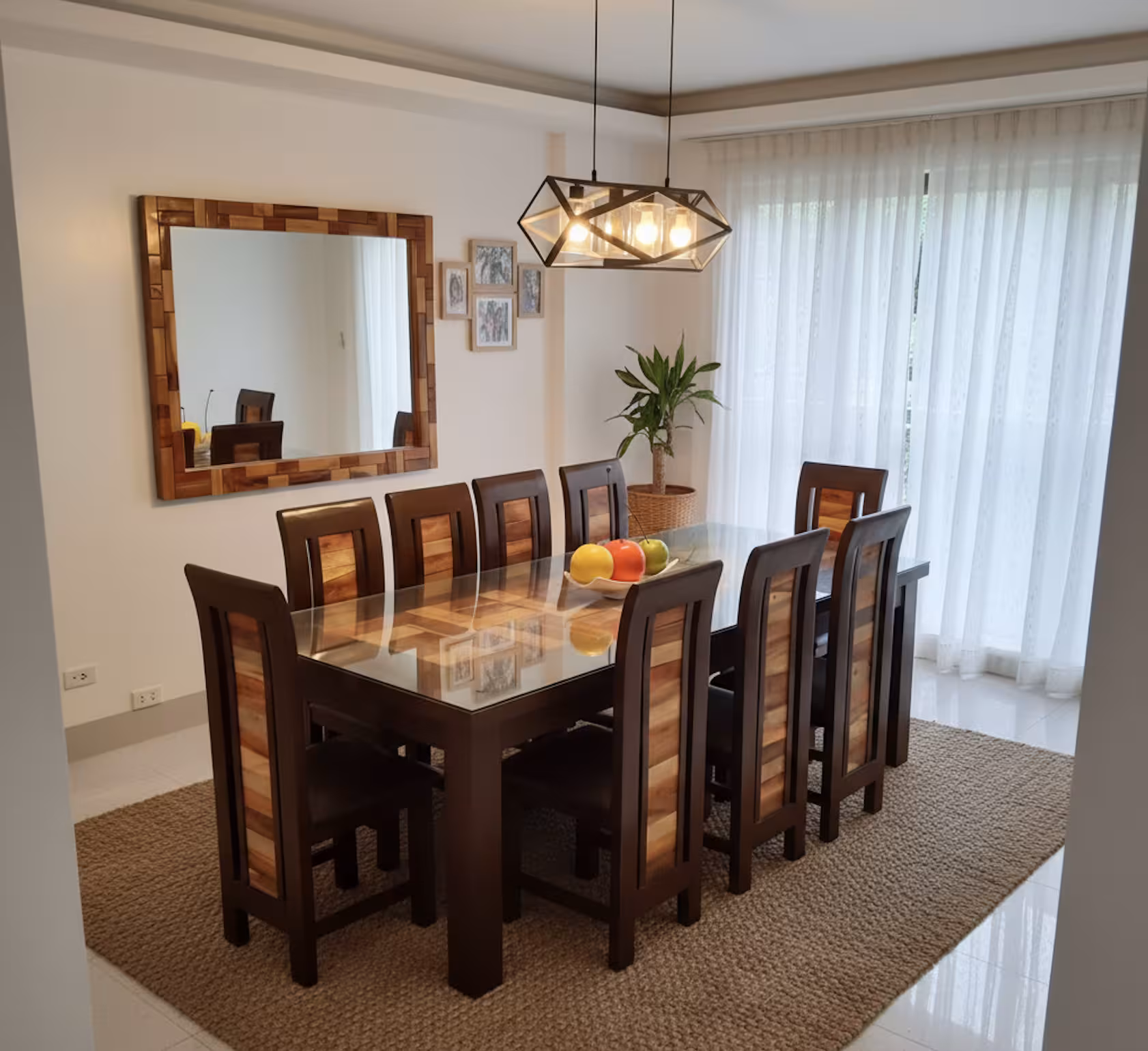 Aurora dining set in a room with a wood-framed mirror