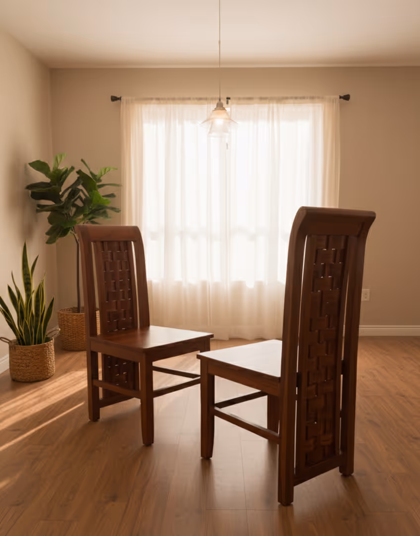 Two Imperia chairs showing their woven backs